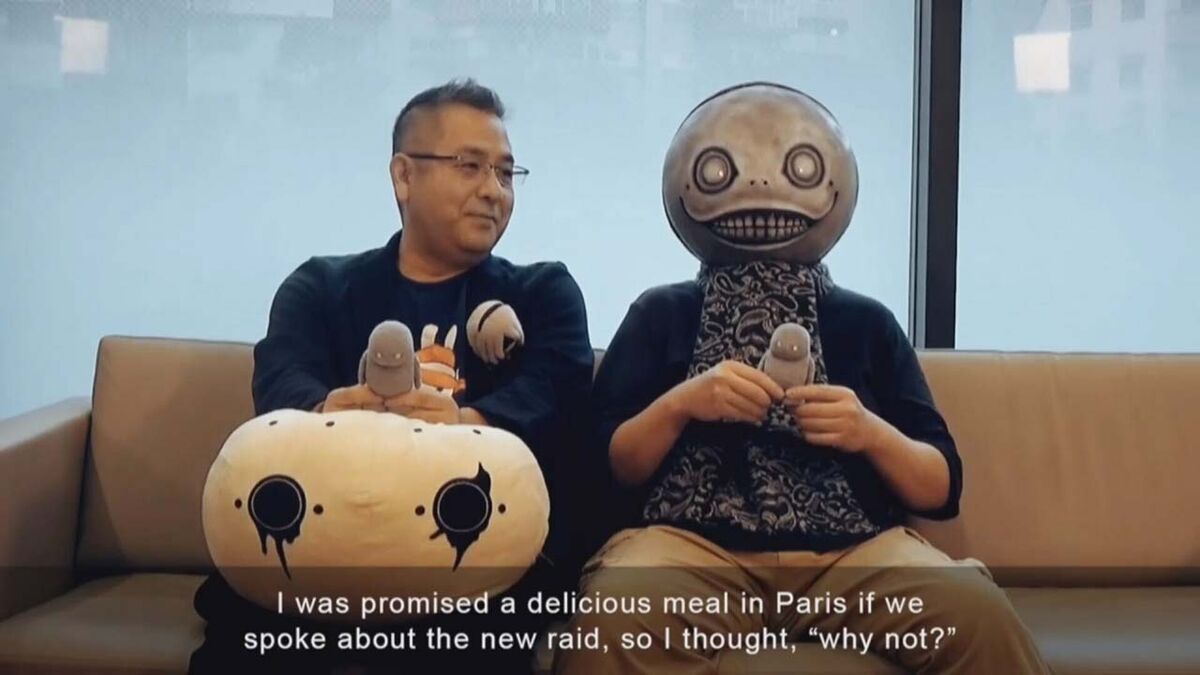 Yoko Taro sits with Yoshida