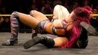 Sasha-locks-in-the-Bank-Statement-Courtesy-of-WWE.com -0