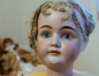 small porcelain doll heads