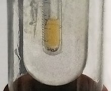 220px-Liquid fluorine tighter crop
