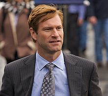 Aaron-Eckhart-Traveling