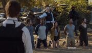 Burke Interrogating Red Hand Members