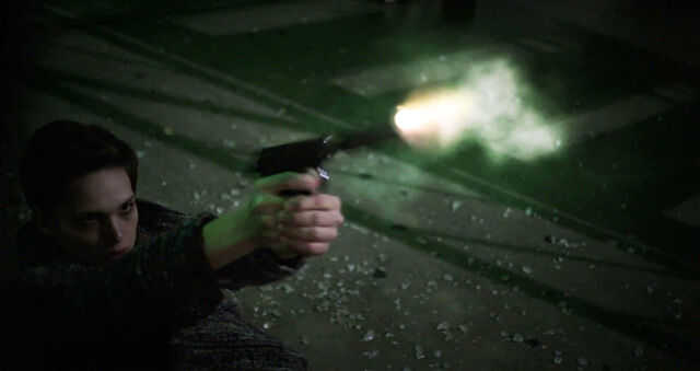 File:Sara-Serraiocco-as-Baldwin-muzzle-flash-on-Counterpart-Season-1-Episode-1-The-Crossing.jpg