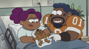 Rashida and Russell cooing at Remy