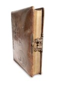 21805410-an-closed-old-leather-bound-antique-book-with-a-brass-lock-and-hasp-on-an-isolated-background
