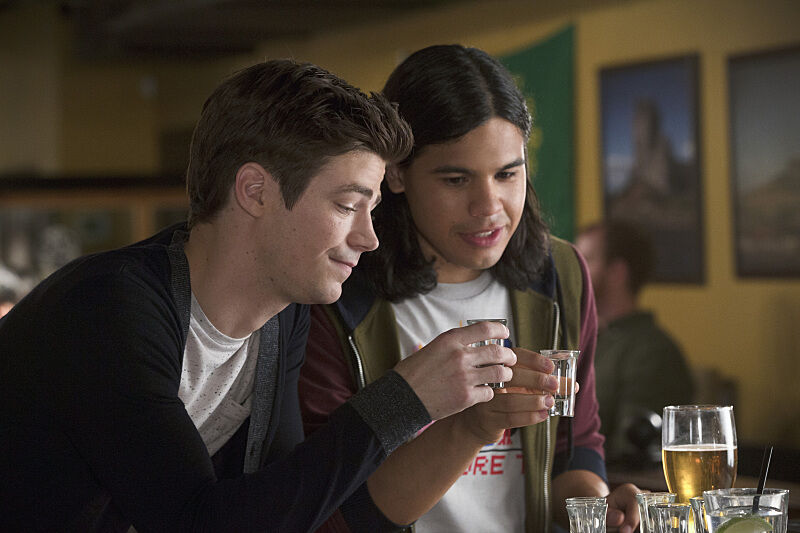 Barry Allen and Cisco Ramon, from The Flash, take a shot. 