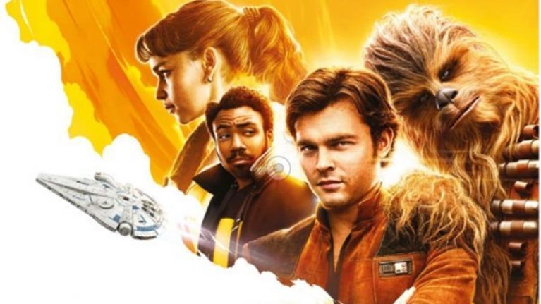 A promotional image for Solo, featuring Han, Lando, Chewbacca and Qi'ra, with the Millennium Falcon.
