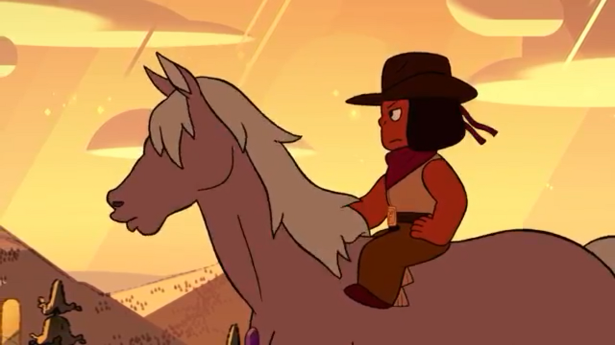 Ruby wearing a cowboy attire while riding a horse.