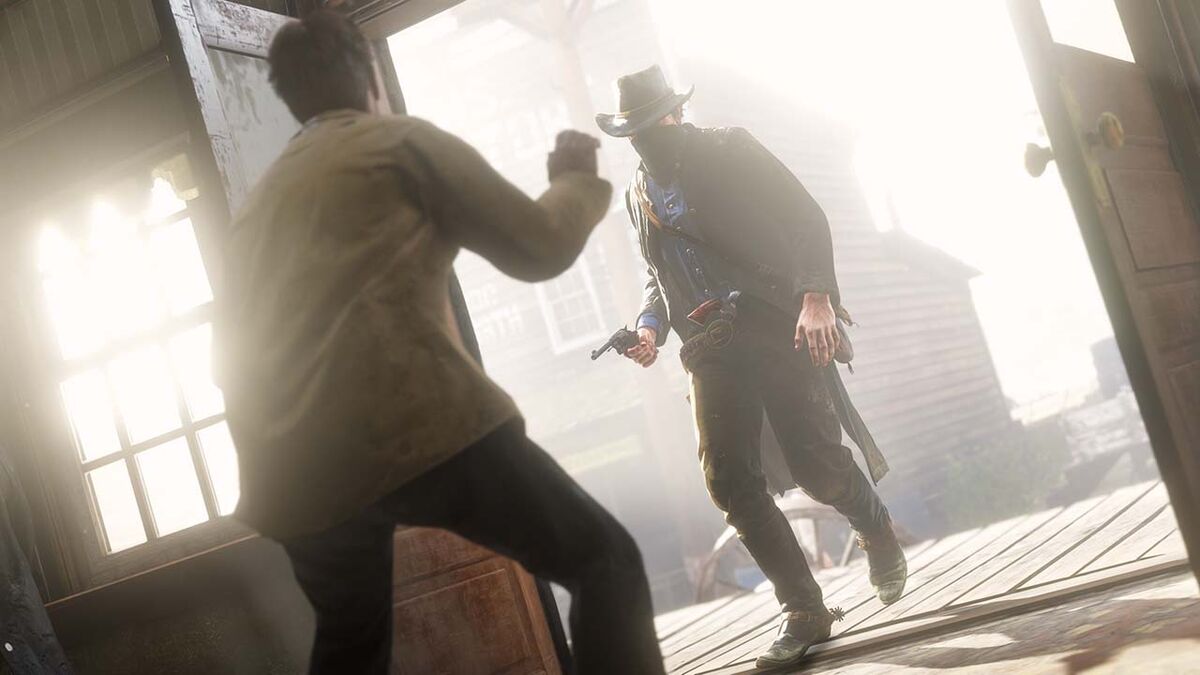 Walking into a saloon with a gun drawn and bandana mask in Red Dead Redemption 2.
