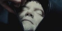 Zod's corpse in a body bag