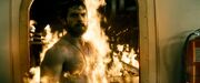 Clark walking through fire