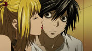 Misa-gives-L-a-peck