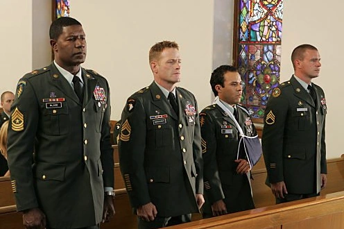 Image - DHS- Jonas Blane and The Unit team in decorative uniform.png