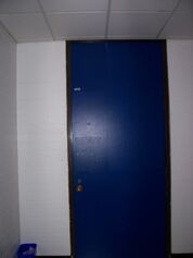 Room A113 blue door