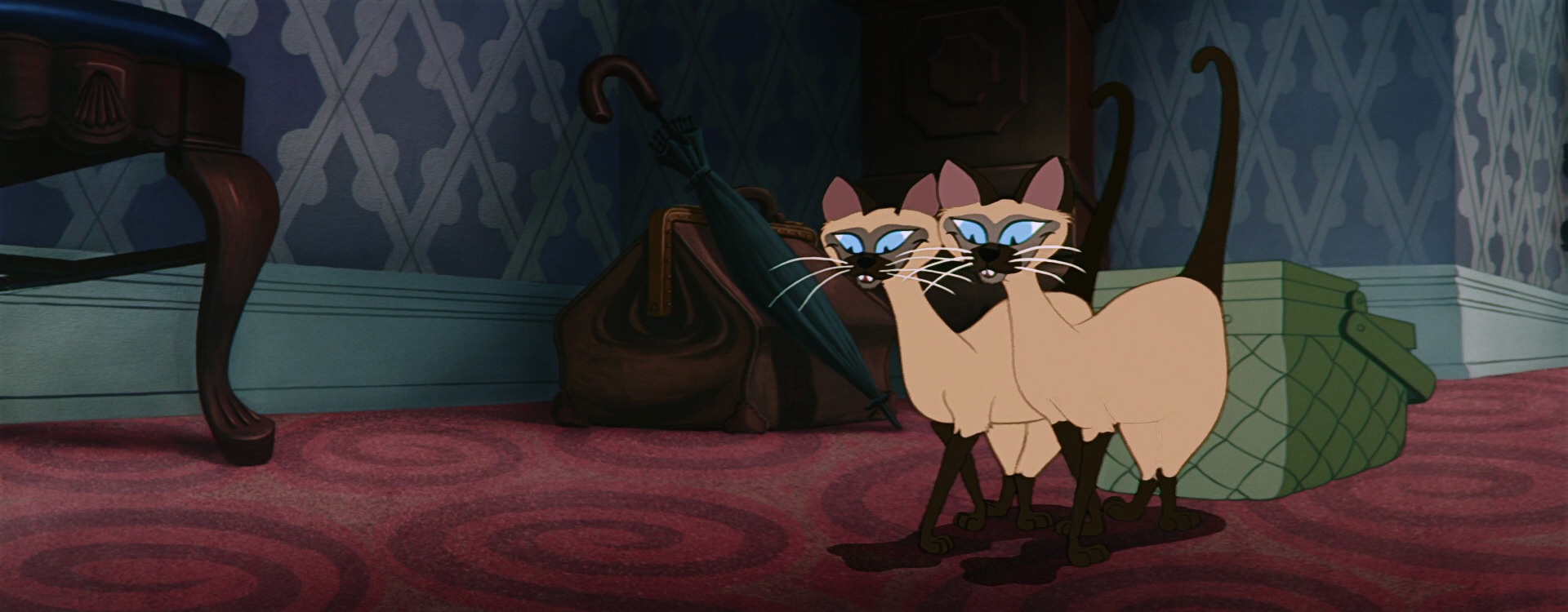 What are the Siamese cats called in Lady and the Tramp?