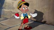 Pinocchio with apple