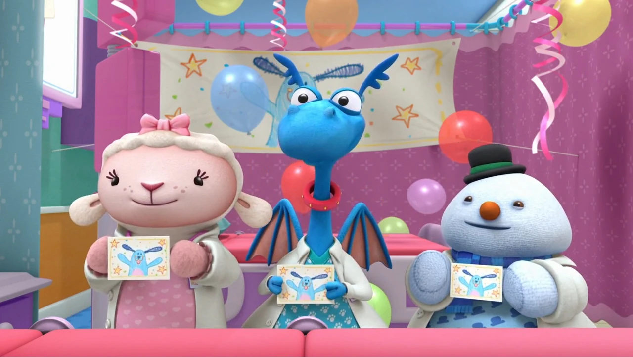 Image Lambie, stuffy and chilly hold up boppy's invitations.jpg Doc
