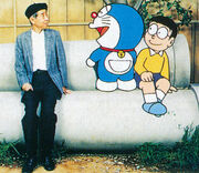 Fujiko with Nobita and Doraemon