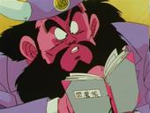King yemma looking in book