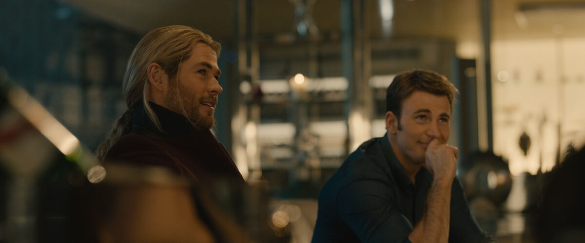 Captain America and Thor sitting at the bar.
