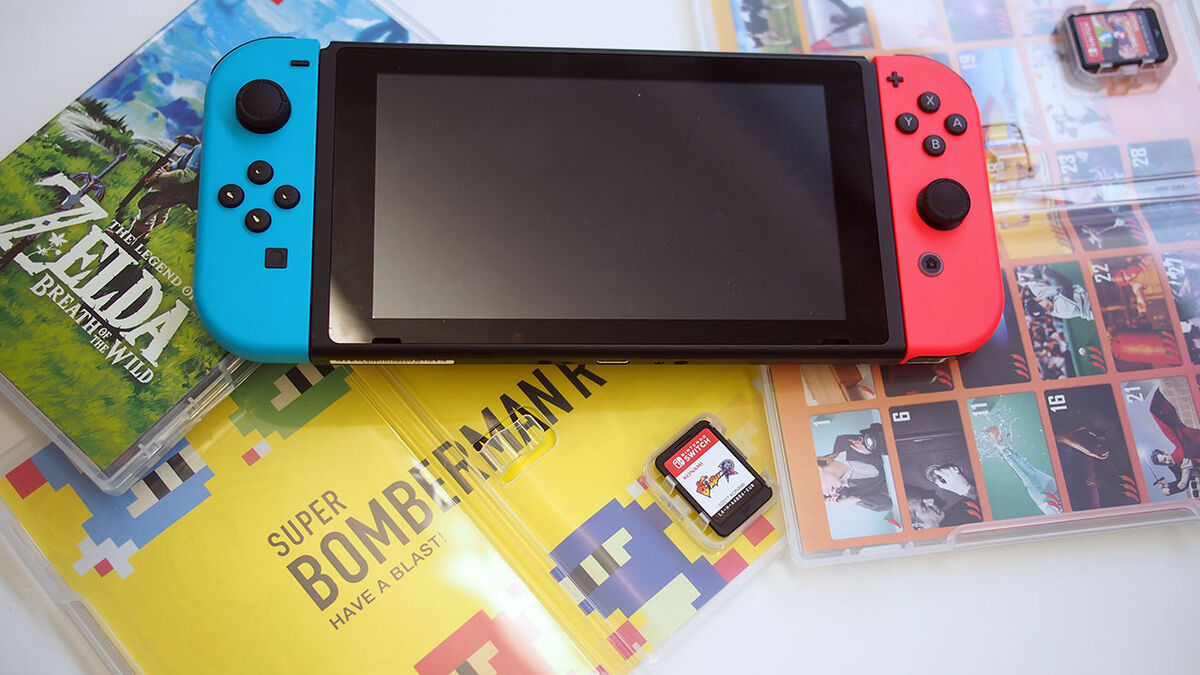 Nintendo Switch with games in boxes