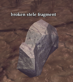 Broken stele fragment