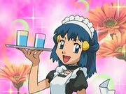 EP531 Maya vestida para atender en el café