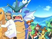 EE04 Gyarados de Misty y Combusken de Aura lastimados