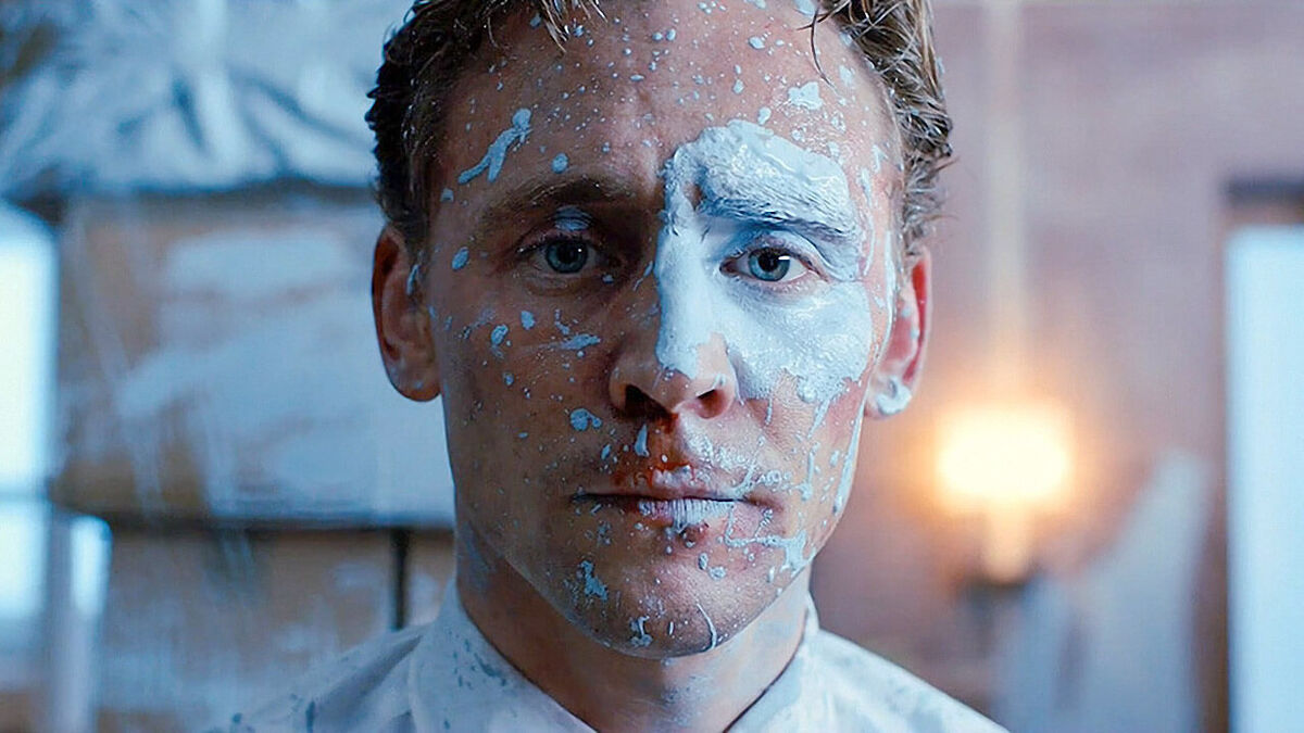 high rise fassbender with blue paint splashed on his face