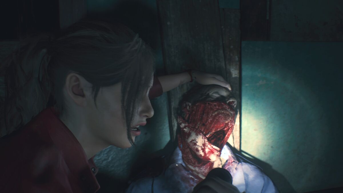 Resident Evil 2 Claire and zombie victim