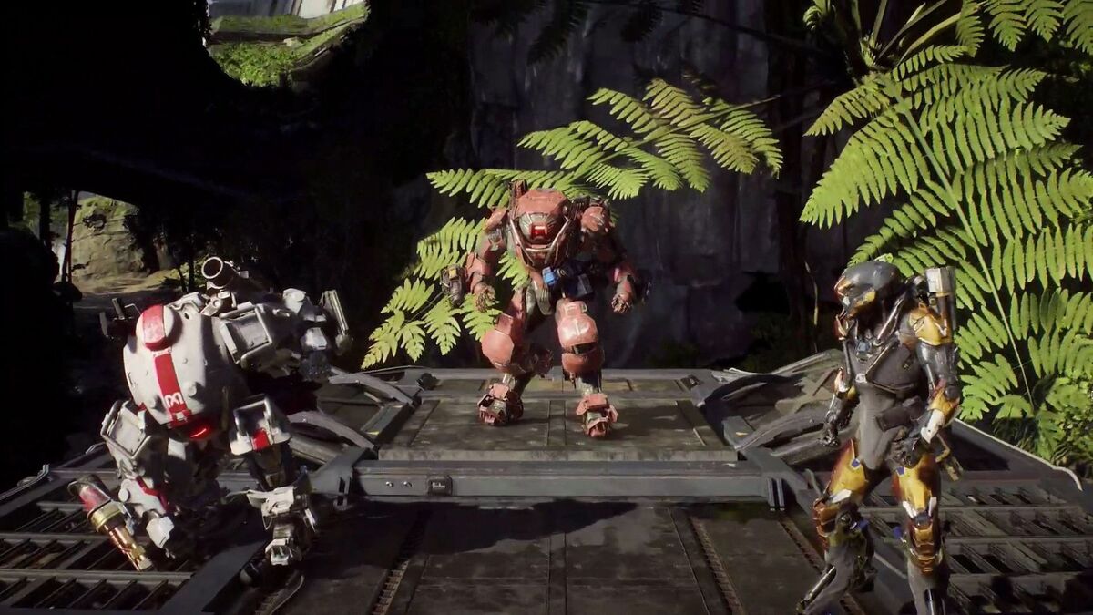 Three Javelin suits stand on a platform