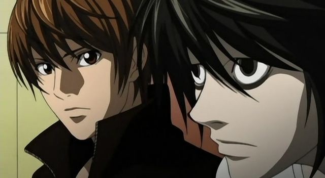 Light Yagami looks over at L.
