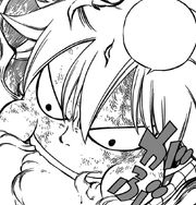 Natsu dévore les flammes du dragon de feu