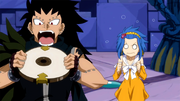 Gajeel wanting to eat the clock part