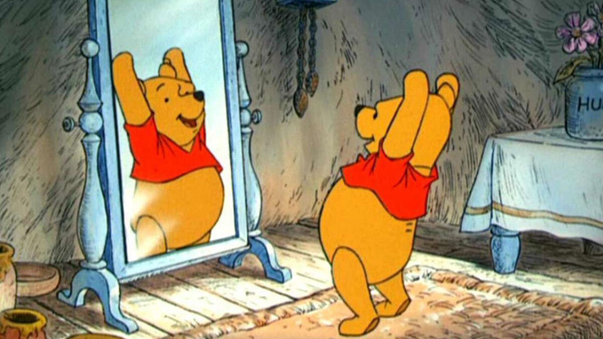 Pooh does exercises in mirror