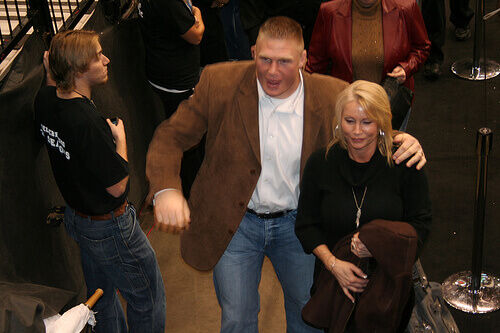 Lesnar (with wife Rena) was out for months with Diverticulitis