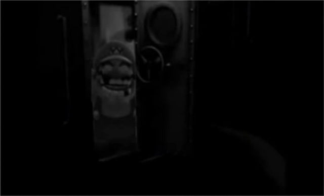 File:Wario at the door.png