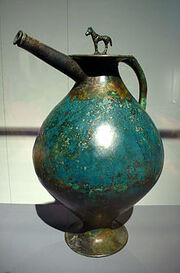 Spouted bronze flagon