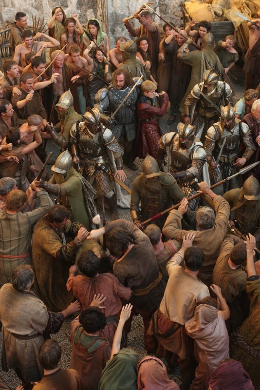 The Kingsguard defends Joffrey during the Riot of kings landing. 