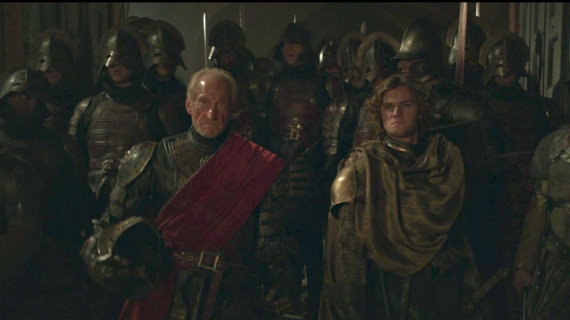 Tywin and Loras lead their victorious forces into the throne room