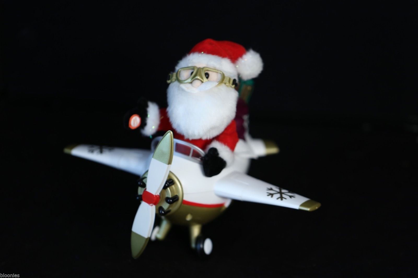 image gemmy animated santa claus in airplane moving propeller