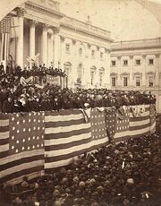 A large crowd of people outside the United States Capitol building