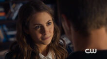 Willa holland as thea queen in a schoolgirl uniform in arrow