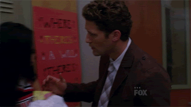 Santana in hallway crying