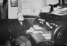James Talcott at desk