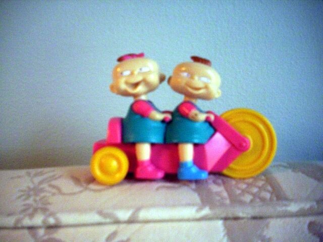 File:Phil and Lil on a trike toy.jpg