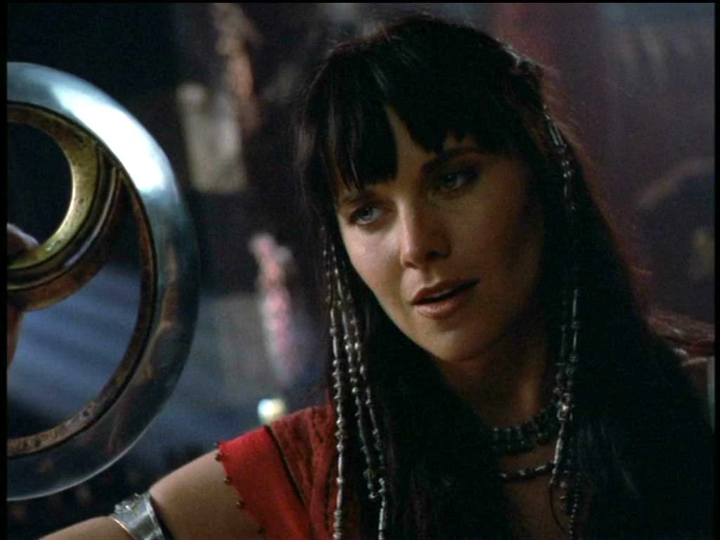 xena places the broken halves of her dark chakram into one of