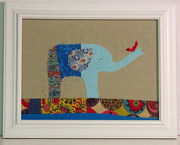 Elephant with Red Bird
