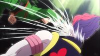 Gon punches Hisoka in da face