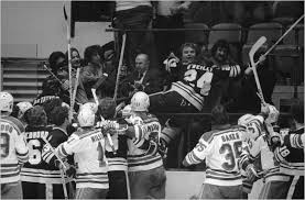 Terry O'Reilly going into stands